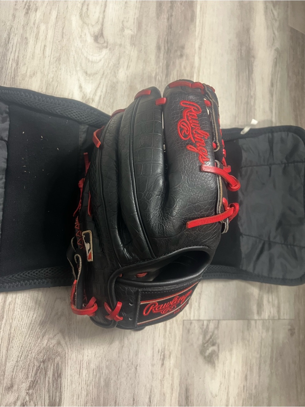 Rawlings Black Baseball Glove with Red Lacing